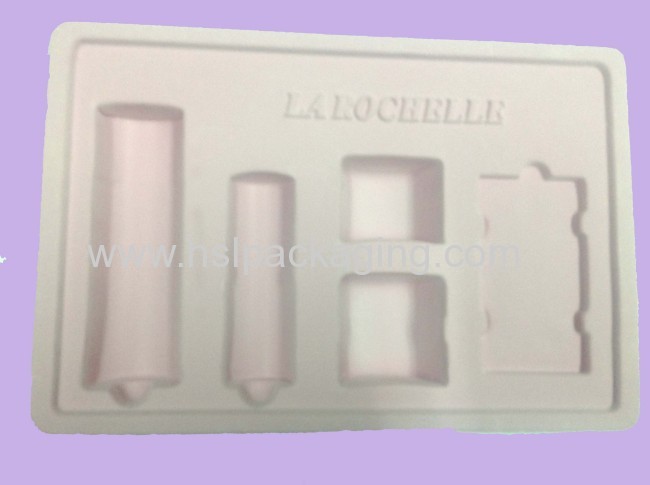 Flocked blister tray for cosmetic product packaging