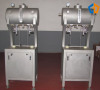 Bottle filling machine with double head