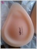 Triangle and oval and spiral shaped silicone breast enhancer for bigger breasts after surgery