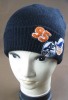 Double layer knitted hat with applique embroidery and towel embroidery