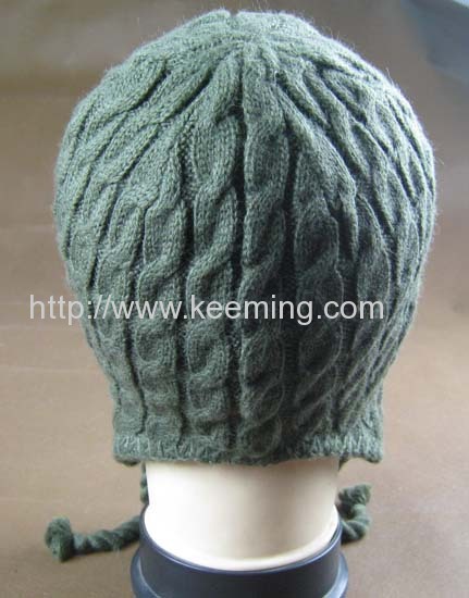 Cable needle earflap hat with part of fleece lining