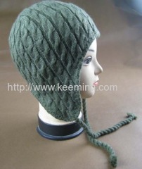 Cable needle earflap hat with part of fleece lining