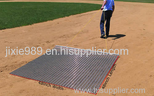 Hand drag mat makes ground and lawn maintenance easier