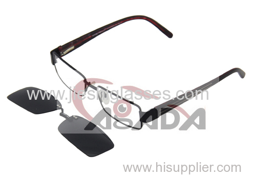 Optical frame with clip-on sunglasses