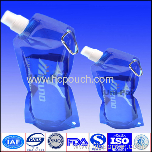 plastic stand up shaped pouch with hand hole and spout for liquid