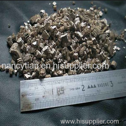 Golden vermiculite (crude) ore