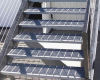 Serrated grating used in commercial and industrial floor systems