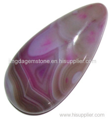 Gemtone pendant made by Madagascar agate with bulk stripes across the surface