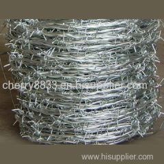 Chain link fence top barbed wire