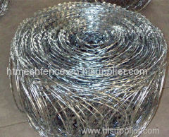 China Galvanzied Flat Razor Barbed Wire sharp razor barbed wire