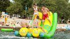 classic inflatable water gams double rocker and inflatable banana boat with yellow green