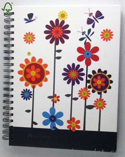 colored spiral notebook with flower and butterfly
