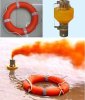life buoy with self-igniting light and self-activating smock signals