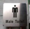 male toilet sign plate with braille dots