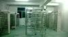 Bidirectional access control full height turnstiles for automated gate systems