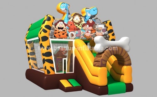 The Stone Age Inflatable Castle with Slide