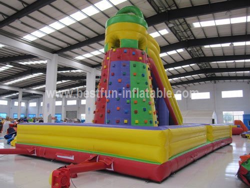 Inflatable slide climbing rock wall