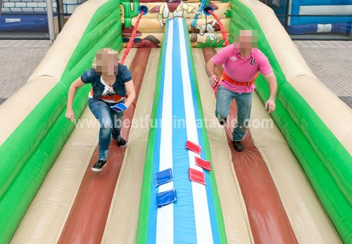 Inflatable bungee run for carnival games