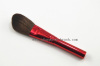 Red metal handle makeup brush