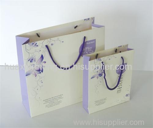 white and purple high quality handle bags