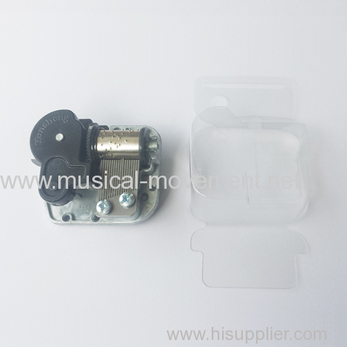 METAL TIN MUSIC BOX MOVEMENT WITH CLEAR PLASTIC COVER