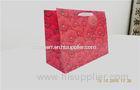 Fancy 157gsm Art Red Custom Printed Paper Gift Bags With Die Cut Handle