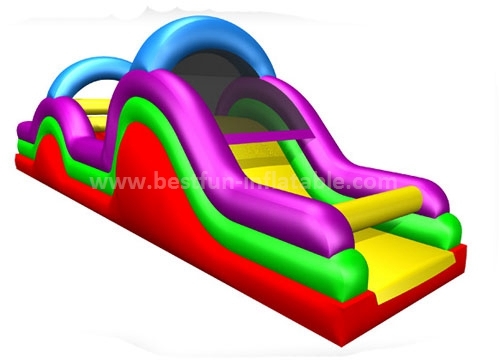 Inflatable obstacle course with slide and tunnel