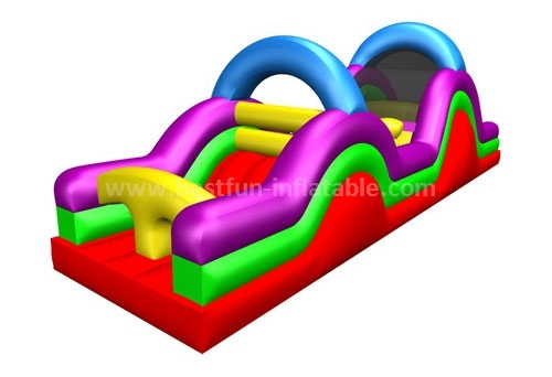 Inflatable obstacle course with slide and tunnel