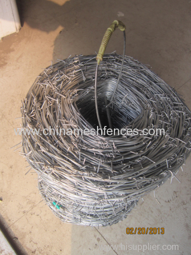 Cheap Hot-dip galvanized or PVC coated barbed wire in coils 