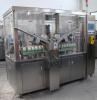 Soft tube filling and sealing machine