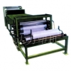 Powdering machine for non-woven fabrics