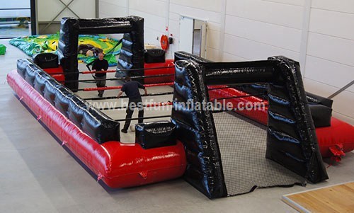 Human Foosball inflatable structure with bars