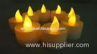 Battery operated yellow flickering LED candles , colored tealight candles