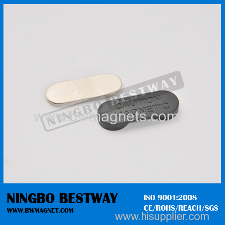 Permanent magnetic name badge fasteners