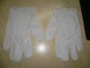 White colour 3.5 mil synthetic vinyl powdered gloves ambidextrous , beaded cuff