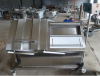 Tilt adjustable vacuum packaging machine