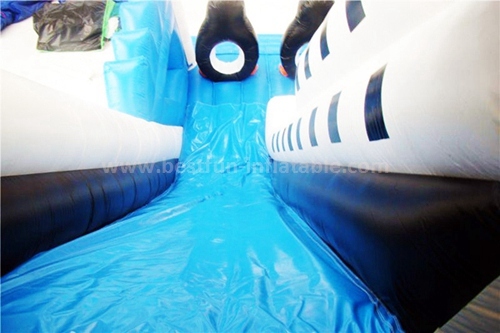 Inflatable madagascar penguin slide