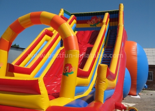 Inflatable slide with arch