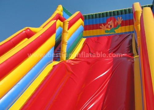 Inflatable slide with arch