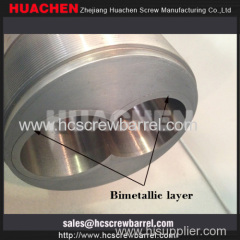 Parallel twin bimetallic screw and bimtallic barrel