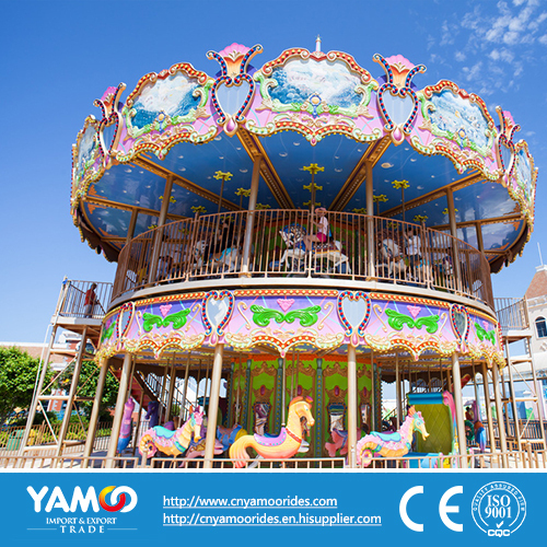carousel ride. kiddie ride. Amusement park.