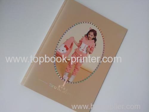 Custom PVC laser film stamped cover design childrens clothes softcover or softback book printing or binding