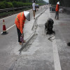 High efficiency concrete repair material for wide cracks