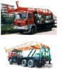 The oil-field mast-carrying truck