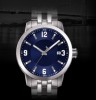 stainless steel watch with blue dial