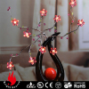 Lighted Red Blossom Branch