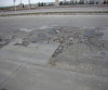 Treatment for concrete parking lots surface peeling