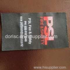 fire retardant woven label for fire retardant coverall