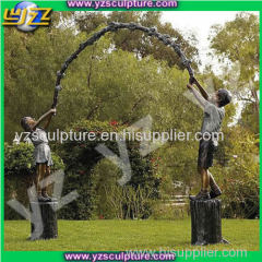 bronze children sculpture of children playing