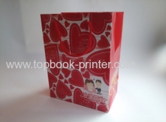 Gloss laminated art paper wedding gift packaging bag with red cotton rope printing